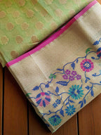 Green Banarasi Saree featuring intricate Meenakari border.