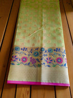Green Banarasi Saree featuring intricate Meenakari border.